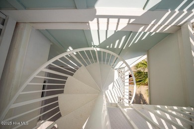 ''A Wave from it All!'' Looking for a refined coastal home where