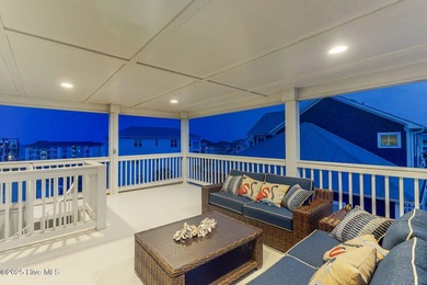 ''A Wave from it All!'' Looking for a refined coastal home where