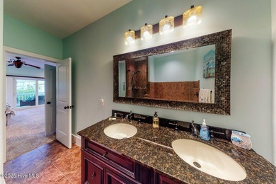 ''A Wave from it All!'' Looking for a refined coastal home where