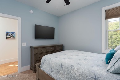 ''A Wave from it All!'' Looking for a refined coastal home where