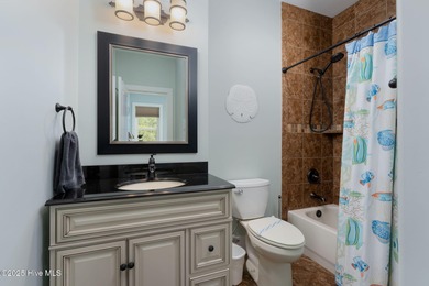 ''A Wave from it All!'' Looking for a refined coastal home where