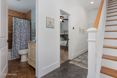 ''A Wave from it All!'' Looking for a refined coastal home where