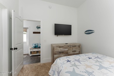 ''A Wave from it All!'' Looking for a refined coastal home where