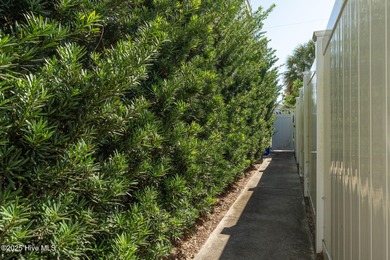 ''A Wave from it All!'' Looking for a refined coastal home where