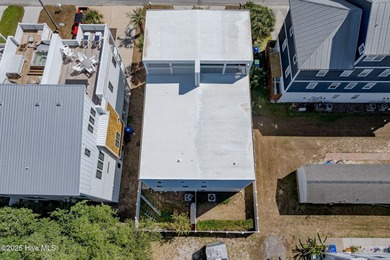 ''A Wave from it All!'' Looking for a refined coastal home where