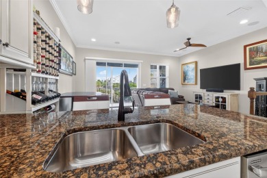 Impeccable coastal Luxury living within this premier gated