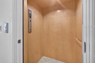 Impeccable coastal Luxury living within this premier gated