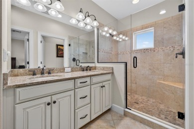 Impeccable coastal Luxury living within this premier gated