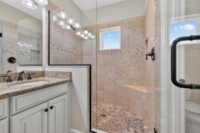 Impeccable coastal Luxury living within this premier gated