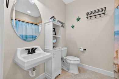 Impeccable coastal Luxury living within this premier gated