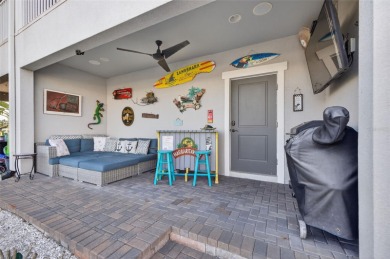 Impeccable coastal Luxury living within this premier gated