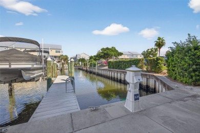 Impeccable coastal Luxury living within this premier gated