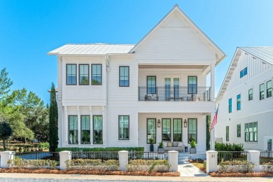 Experience the pinnacle of beachside living in this exquisite