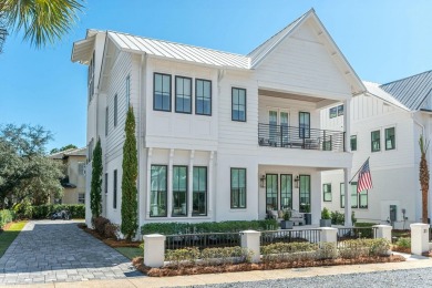 Experience the pinnacle of beachside living in this exquisite