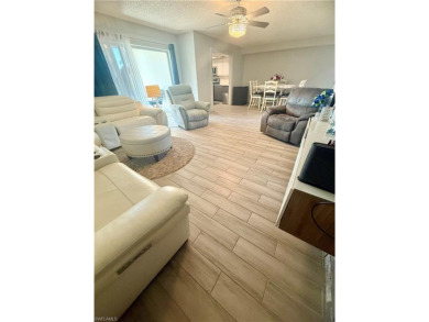 Welcome to this stunning corner unit located on the first floor