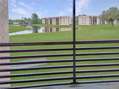 Enjoy stunning golf course and lake views from this bright