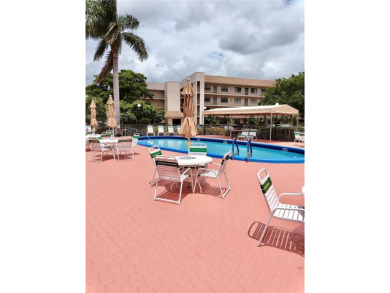 Enjoy stunning golf course and lake views from this bright