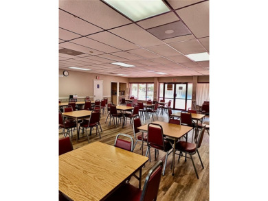 Enjoy stunning golf course and lake views from this bright