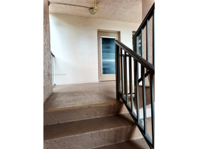 Enjoy stunning golf course and lake views from this bright