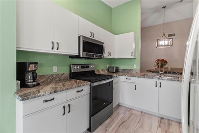 PRICE REDUCTION!!! A MUST SEE, THIS RENOVATED CONDOMINIUM