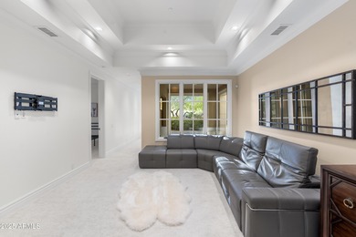 Welcome to 10163 E. Hualapai Drive, a timeless estate nestled in