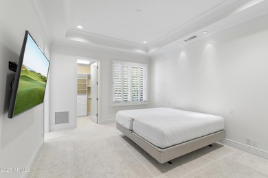 Welcome to 10163 E. Hualapai Drive, a timeless estate nestled in