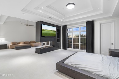 Welcome to 10163 E. Hualapai Drive, a timeless estate nestled in