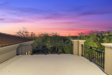 Welcome to 10163 E. Hualapai Drive, a timeless estate nestled in