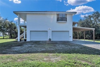 This 3 bedroom, 2 bath raised home with all of the living area