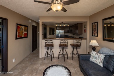 Desirable View Condo at Queensbay! This stunning lake-view condo