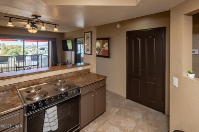 Desirable View Condo at Queensbay! This stunning lake-view condo