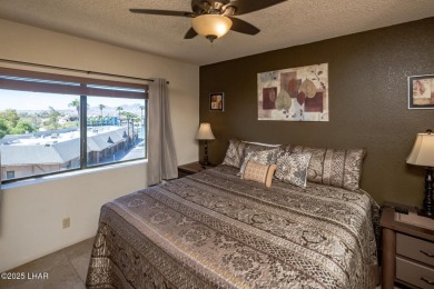 Desirable View Condo at Queensbay! This stunning lake-view condo