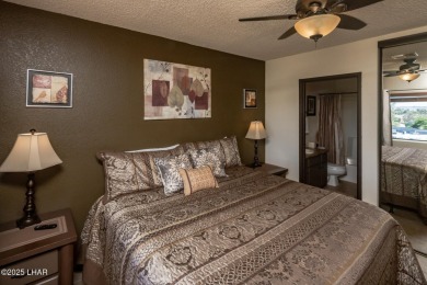 Desirable View Condo at Queensbay! This stunning lake-view condo