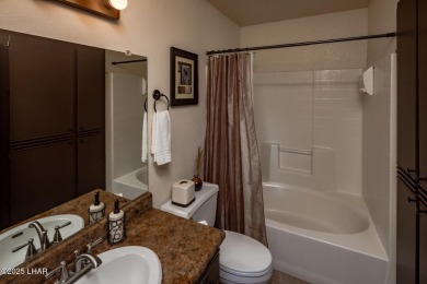 Desirable View Condo at Queensbay! This stunning lake-view condo