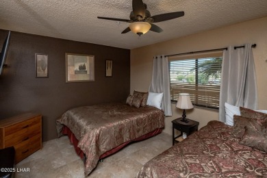 Desirable View Condo at Queensbay! This stunning lake-view condo