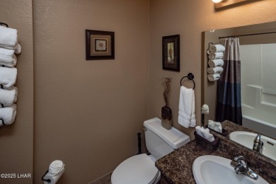 Desirable View Condo at Queensbay! This stunning lake-view condo