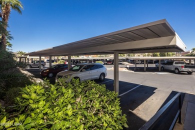 Desirable View Condo at Queensbay! This stunning lake-view condo