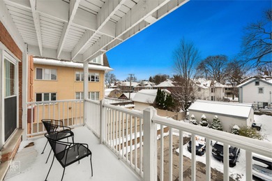 Discover effortless downtown living in this beautifully updated