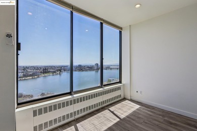 Breathtaking lake views from this bright, impeccably maintained