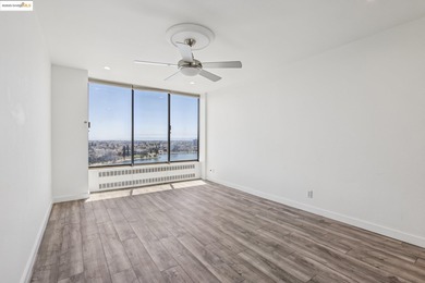 Breathtaking lake views from this bright, impeccably maintained