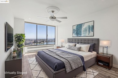 Breathtaking lake views from this bright, impeccably maintained