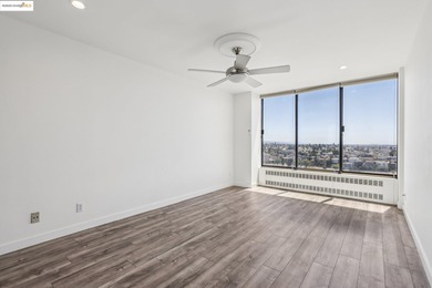 Breathtaking lake views from this bright, impeccably maintained