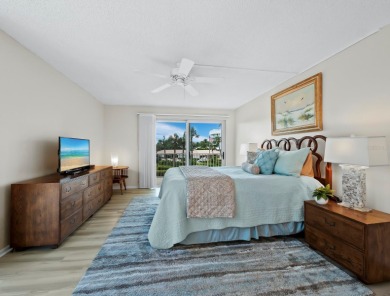 This inviting residence at the Islander Club of Longboat Key