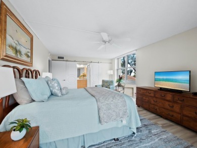 This inviting residence at the Islander Club of Longboat Key