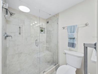 This inviting residence at the Islander Club of Longboat Key