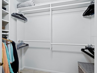 This inviting residence at the Islander Club of Longboat Key