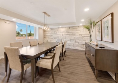 This inviting residence at the Islander Club of Longboat Key