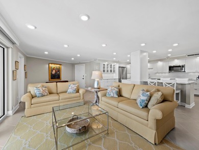 FULLY RENOVATED - Set high on the 10th floor with direct Gulf