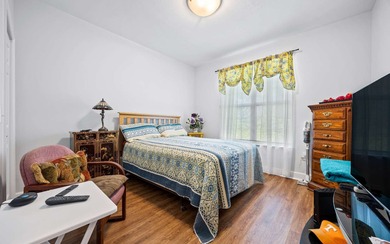 Gorgeous home in a vibrant 55+ community nestled near the