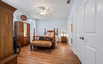 Gorgeous home in a vibrant 55+ community nestled near the